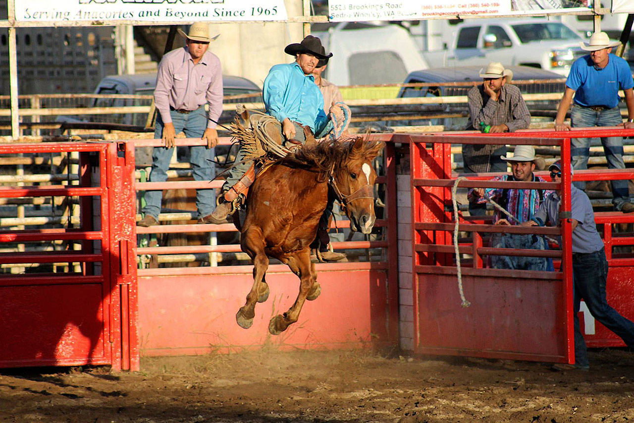 This weekend’s Darrington Timberbowl Rodeo will feature bull riding, barrel racing and bronc riding, as shown here at last year’s event. (Toni Lenon)