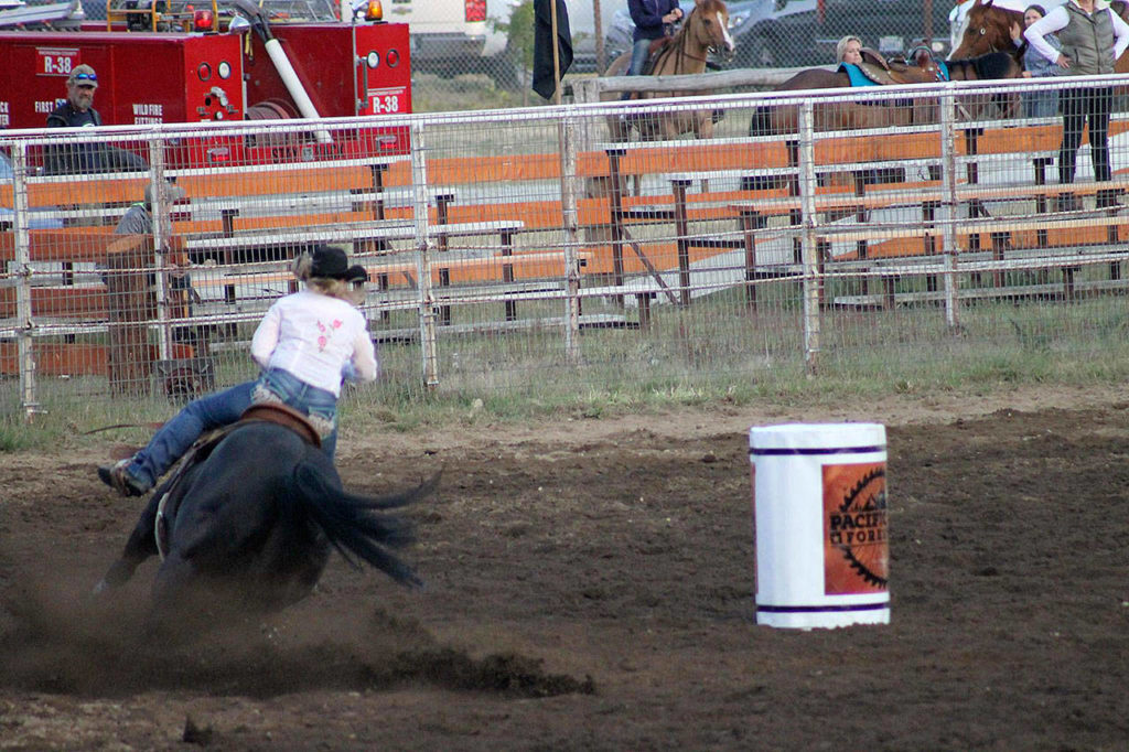 The Darrington Timberbowl Rodeo is scheduled on Saturday and Sunday with some 75 contestants expected to ride each day. Shown here is last year’s barrel racing event. (Toni Lenon)
