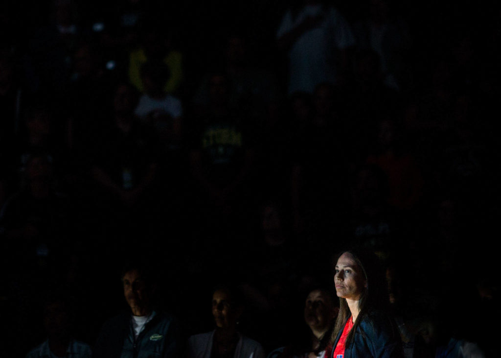 Seattle Storm’s Sue Bird stands during the national anthem wearing Megan Rapine’s USWNT jersey before the game against the Los Angeles Sparks at Angel of the Winds Arena on Friday, June 21, 2019 in Everett, Wash. (Olivia Vanni / The Herald)