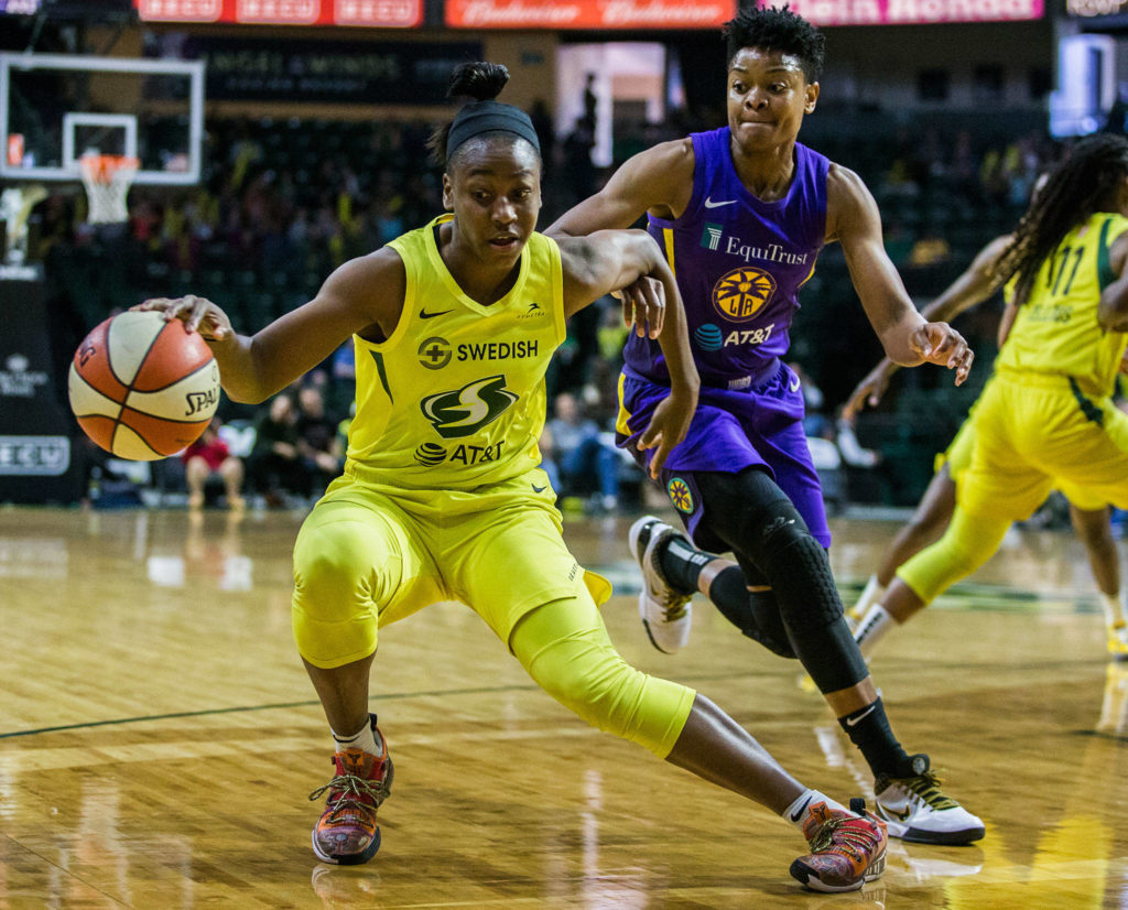 Seattle Storm’s Jewell Loyd tries to get around Los Angeles Sparks’ Alana Beard during the game at Angel of the Winds Arena on Friday, June 21, 2019 in Everett, Wash. (Olivia Vanni / The Herald)