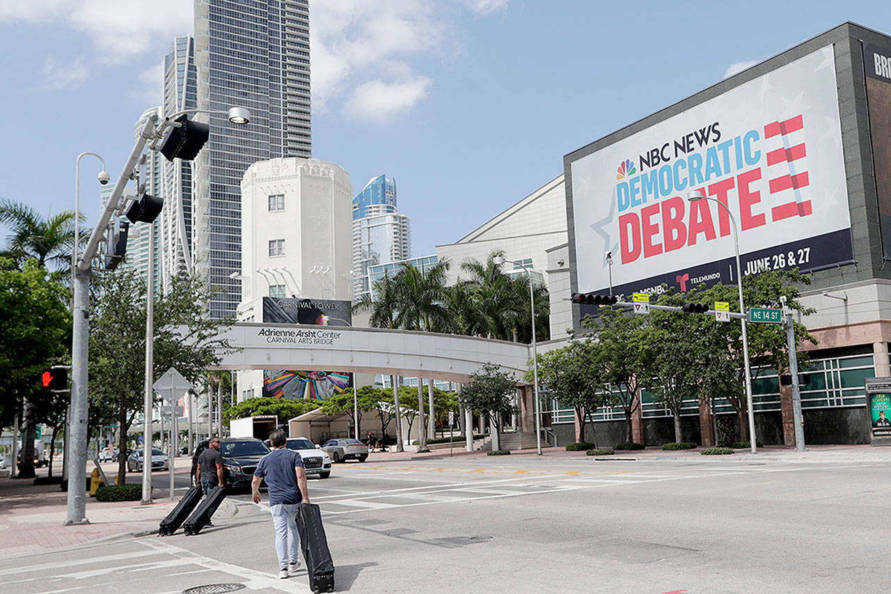 A billboard advertises the Democratic Presidential Debates across from the Knight Concert Hall at the Adrienne Arsht Center for the Performing Arts of Miami-Dade County, in Miami. (Associated Press)