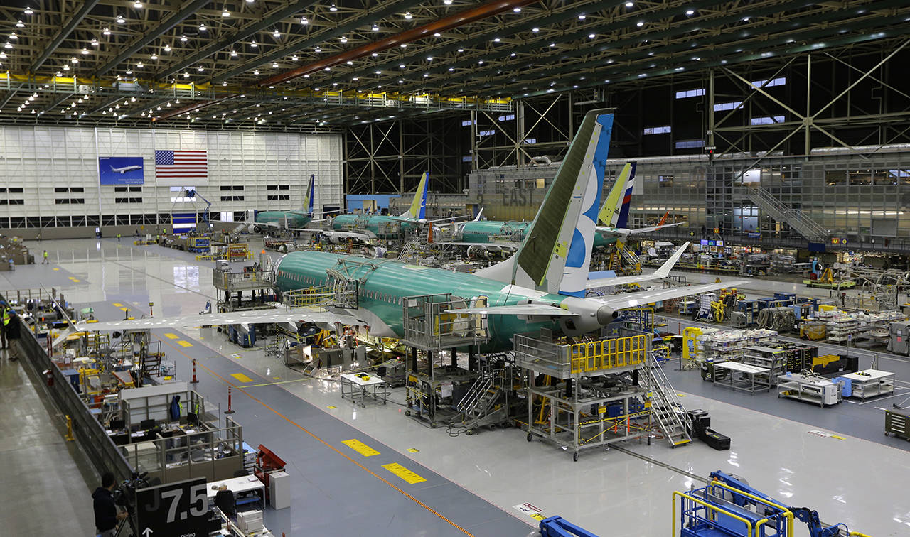 This 2015 photo shows the second Boeing 737 MAX airplane being built on the assembly line in Renton. (AP Photo/Ted S. Warren, File)