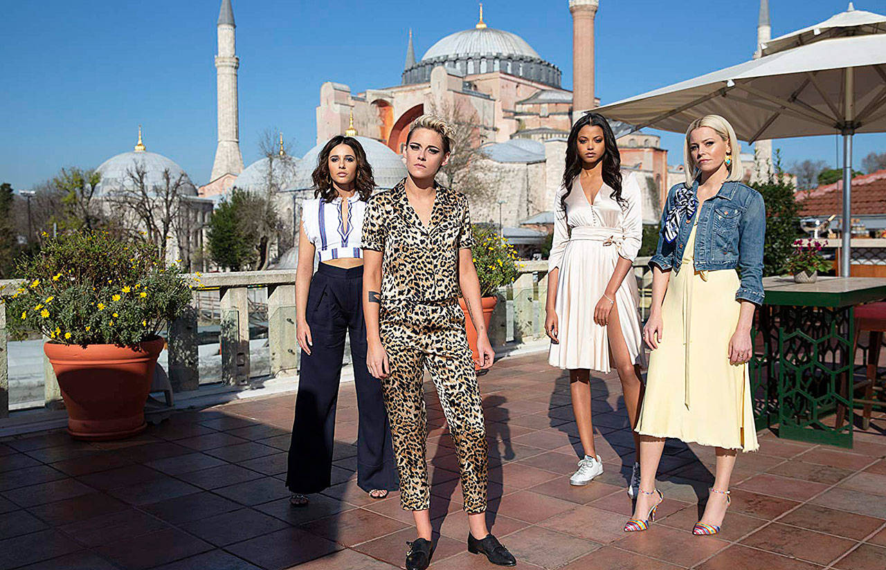 The “Charlie’s Angels” reboot stars Elizabeth Banks (right) as Bosley, and Kristen Stewart (left), Naomi Scott and Ella Balinska as the crime-fighting trio. (Chiabella James/CTMG Inc.)