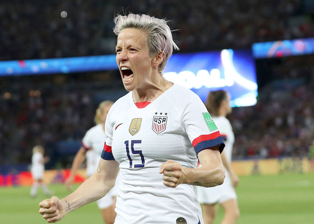 Megan Rapinoe celebrates after scoring the United States’ second goal during a quarterfinal match at the Women’s World Cup on Friday at Parc des Princes in Paris. (AP Photo/Francisco Seco)