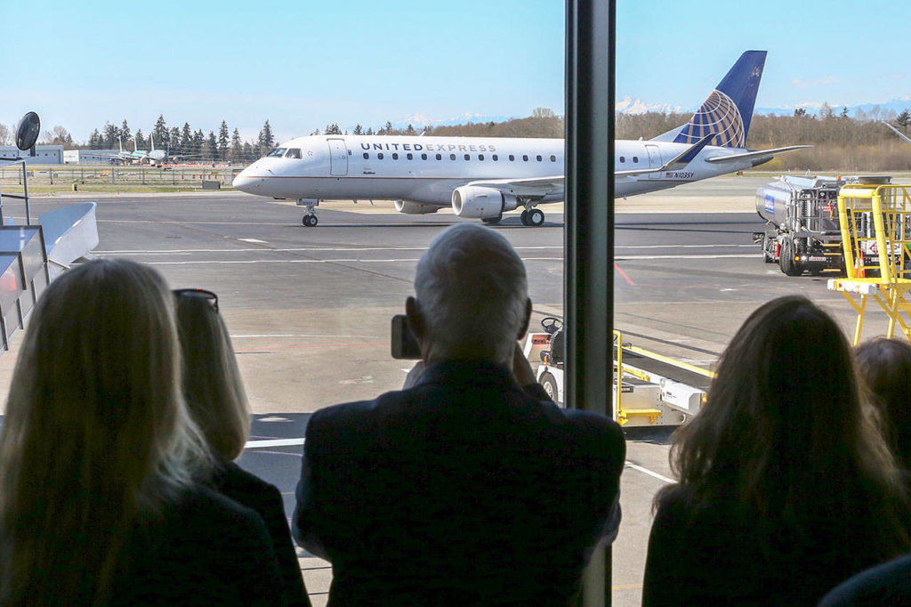 A United Airlines plane arrives at Paine Field in Everett in March. Airline service here is serving happy visitors who need not endure the slog to Sea-Tac Airport. (Kevin Clark / Herald file)
