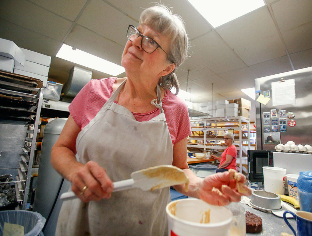 Mary Thorgerson starts baking early in the morning, while it’s still dark outside. (Dan Bates / The Herald)
