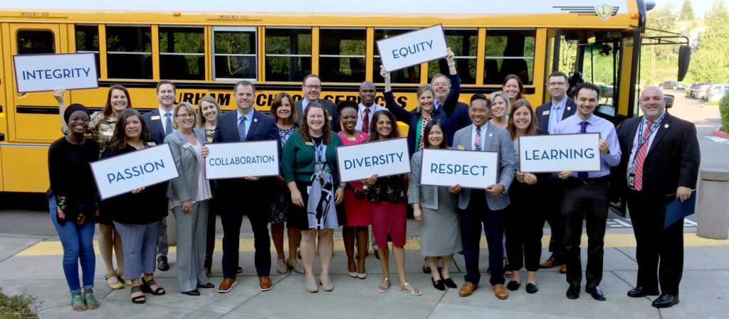 Incoming administrators in Everett Public Schools received an introduction from new Superintendent Ian Saltzman (far right) prior to their two-day professional development bus tour through the district. (Everett Public Schools)
