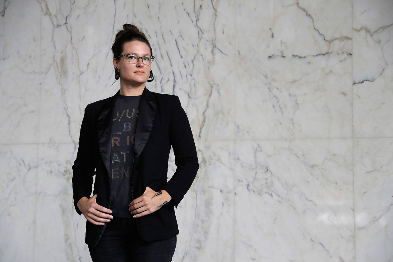 Hannah Moore poses for a portrait in Los Angeles on June 26. Moore has struggled to save since graduating from college in December 2007, the same month the Great Recession officially began. She has worked nearly continuously since then despite a couple of layoffs. (AP Photo/Marcio Jose Sanchez)