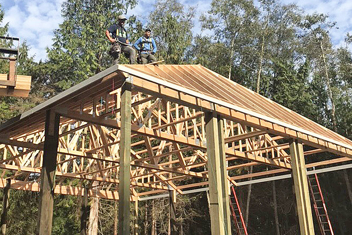 Crew members with Spane Buildings check out some of their handiwork. The company, well-known in the area for its high-quality pole barns and a variety of other buildings, is looking to hire qualified individuals for its carpenter and foreman positions.