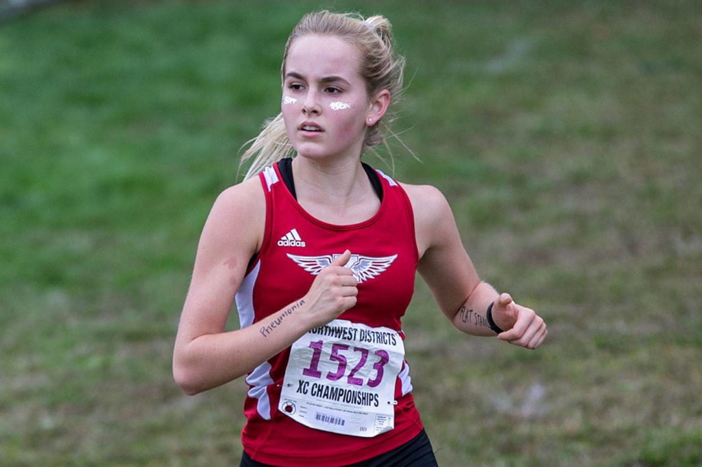 King’s distance runner Naomi Smith won a combined three 1A state titles this past year. (Kevin Clark / Herald file)
