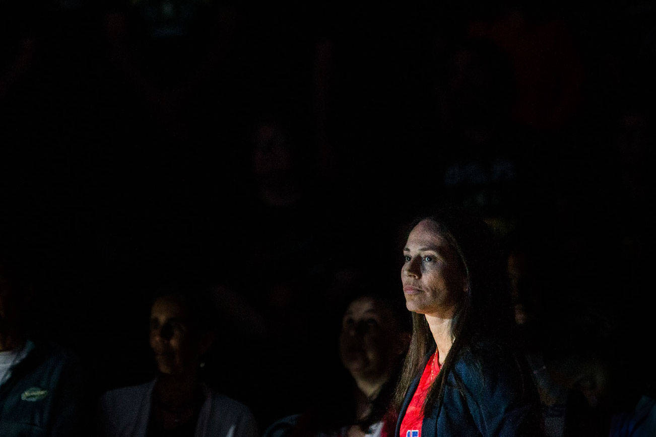 The Seattle Storm’s Sue Bird stands during the national anthem wearing Megan Rapinoe’s USWNT jersey before the game against the Los Angeles Sparks at Angel of the Winds Arena on Friday, June 21, 2019 in Everett, Wash. (Olivia Vanni / The Herald)
