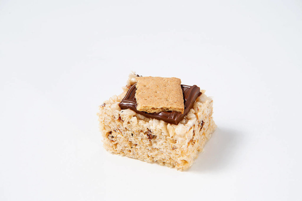 Campfire marshmallow bars are tasty on their own and even more indulgent with melty milk chocolate and crunchy graham crackers. (Mariah Tauger/Los Angeles Times)
