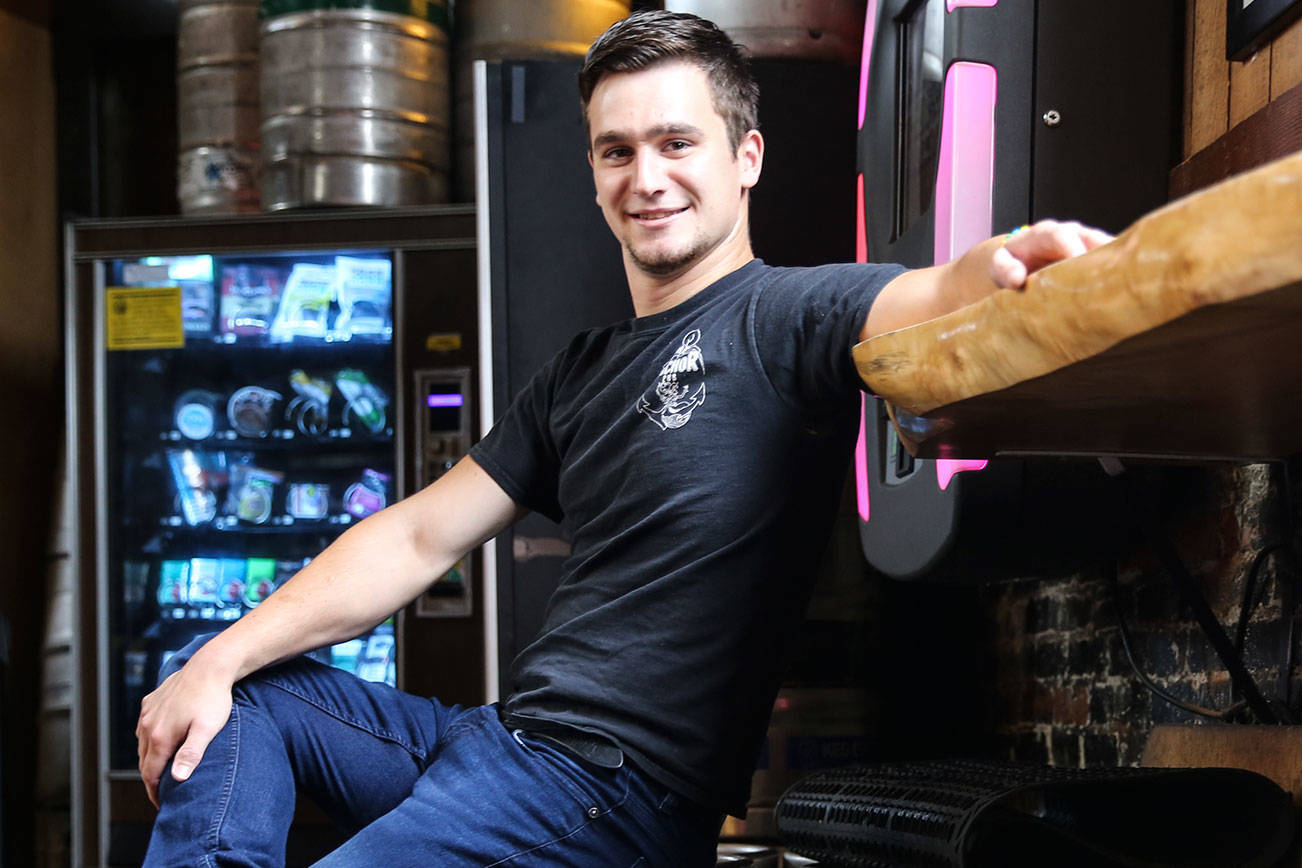 Cameron McCaffree, 26, is a bartender at The Anchor Pub in Everett. (Kevin Clark / The Herald)