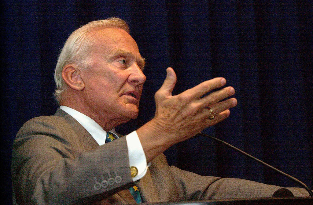 Astronaut Buzz Aldrin, the second man to walk on the moon, speaks at the State Museum in Columbia, South Carolina, in 2001. In 1995 Aldrin gave a talk at the Everett Yacht Club where he promised that space vacations are on the horizon. (AP Photo/Renee Ittner-McManus file)
