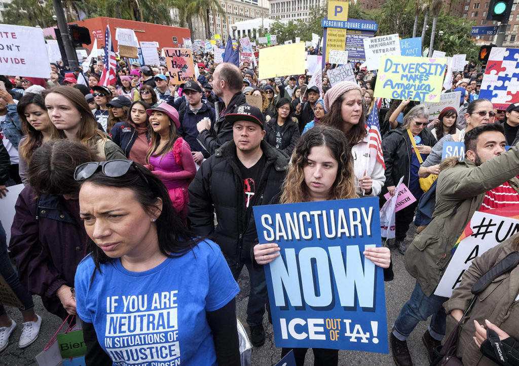 In this Feb. 18, 2017 photo, thousands of people take part in the “Free the People Immigration March,” to protest actions taken by President Donald Trump and his administration, in Los Angeles. (AP Photo/Ringo H.W. Chiu, File)
