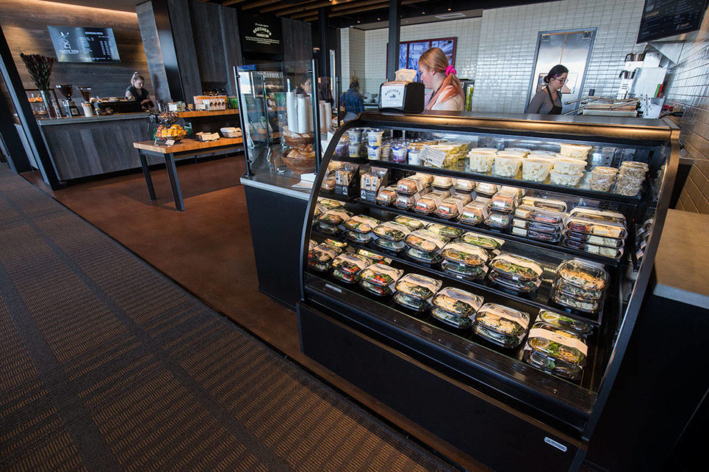 Passengers can pick up ready-to-go meals at Beecher’s in the terminal at Paine Field. (Andy Bronson / The Herald)
