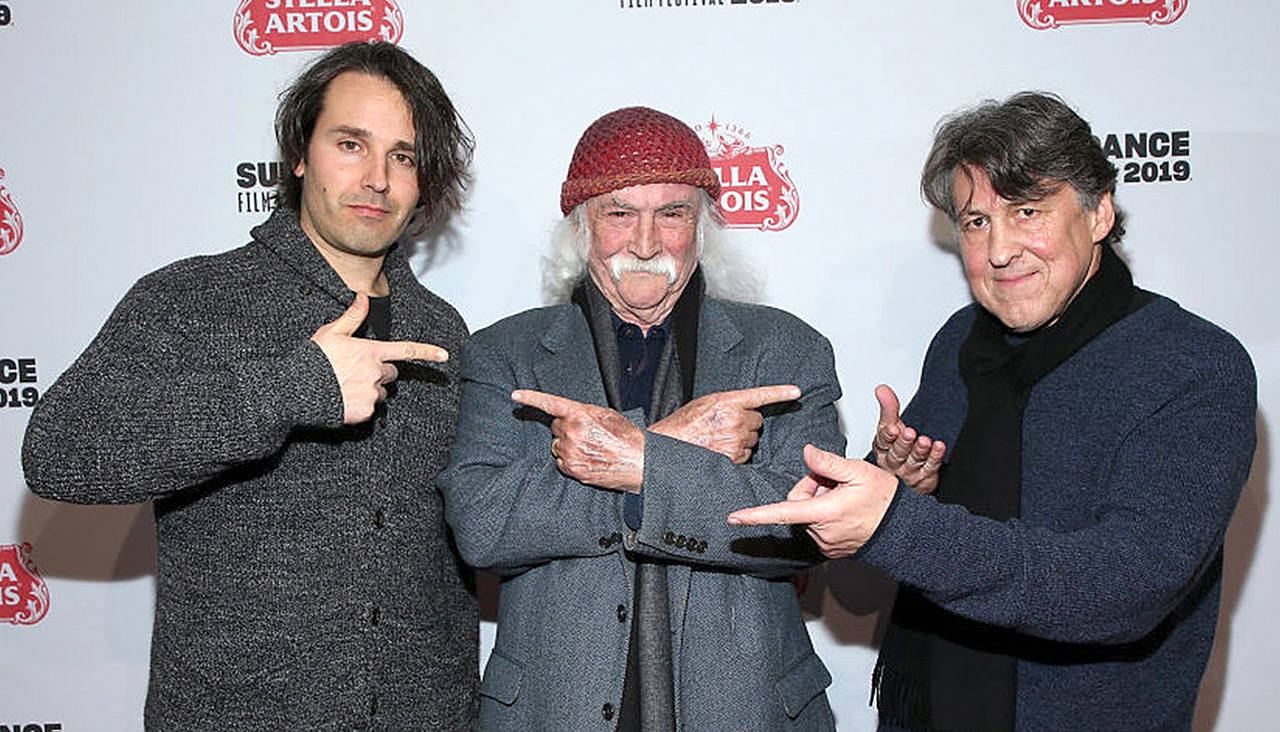 Getty Images / TNS                                 David Crosby (center) is flanked by A.J. Eaton (left) and Cameron Crowe, who directed and produced the new movie “David Crosby: Remember My Name.”