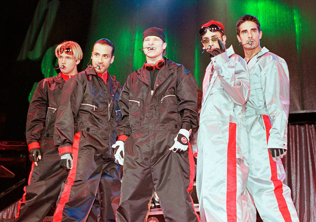 The Backstreet Boys perform in 1998. From left: Nick Carter, Howie Dorough, Brian Littrell, A.J. McLean and Kevin Richardson. (Associated Press file)
