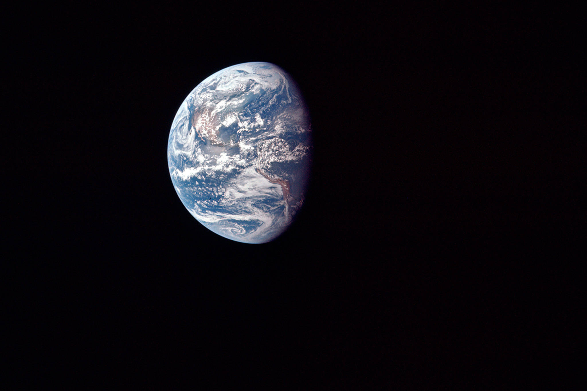 This July 17, 1969 photo made available by NASA shows the Earth as the Apollo 11 mission travels toward the moon. It’s estimated that about 600 million people around the world watched as Neil Armstrong and Buzz Aldrin landed on the moon in 1969. (NASA via AP)