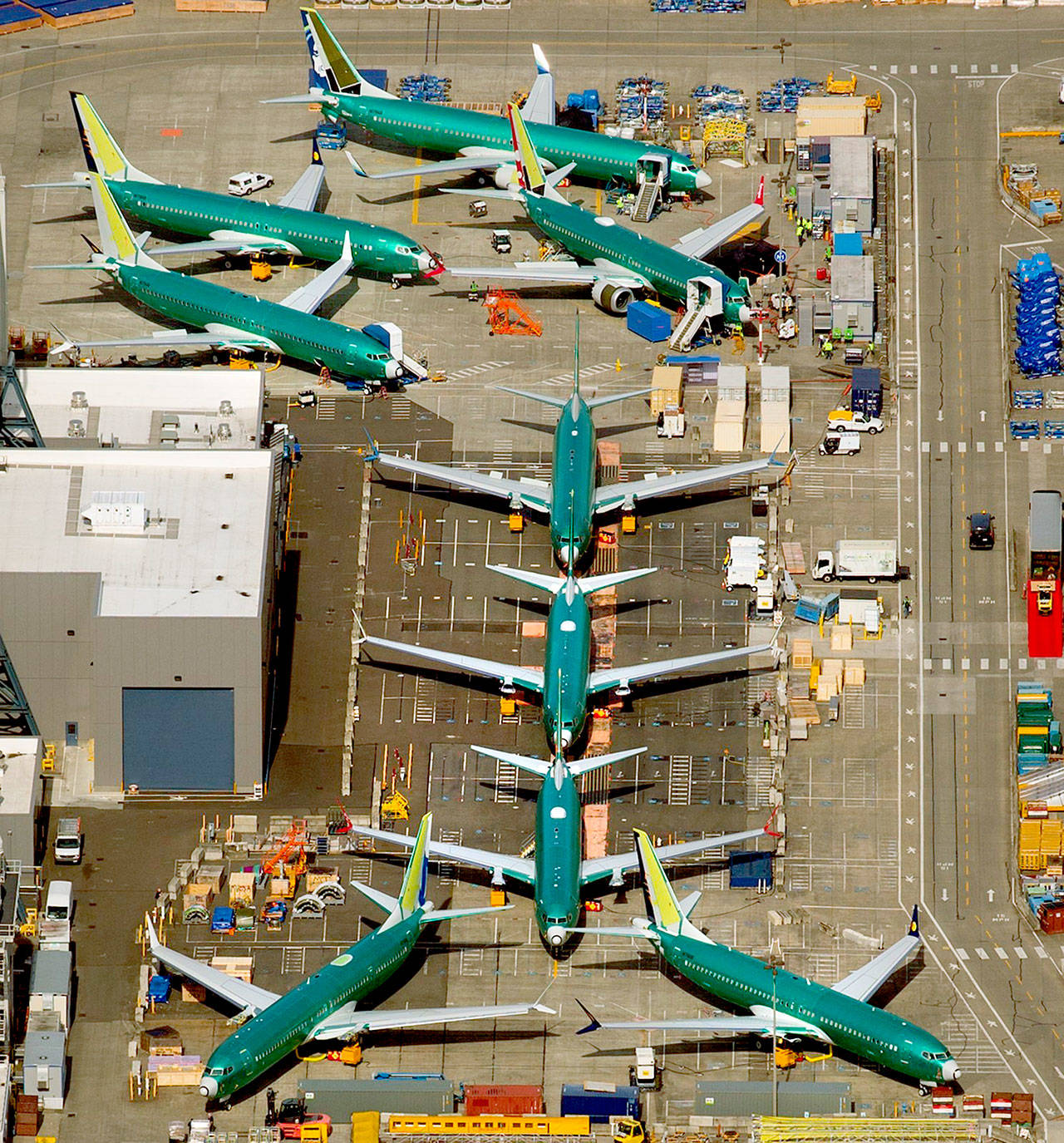 Boeing 737’s, many of which are MAX 8 and 9’s in various stages of completion, are seen parked next to the 737 factory across the runway from the Renton Municipal Airport on March 15. (Mike Siegel/The Seattle Times/TNS)