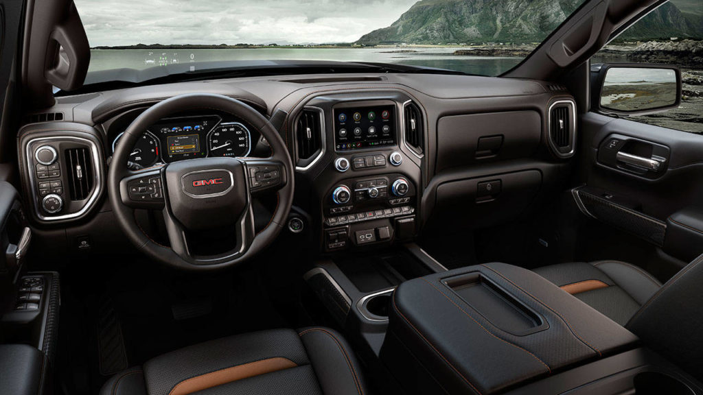 Interior upgrades to the GMC Sierra 1500 for 2019 include several new infotainment system choices. The AT4 interior is shown here. (Manufacturer photo)
