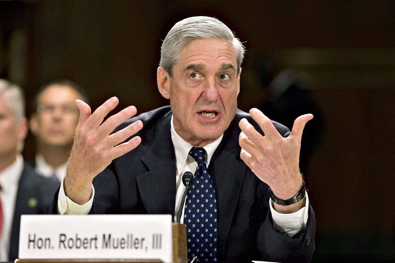 Then-FBI Director Robert Mueller testifies on Capitol Hill in Washington on June 19, 2013. When special counsel Mueller testifies before Congress it will be a moment many have been waiting for, but it comes with risk for Democrats. (AP Photo/J. Scott Applewhite, file)