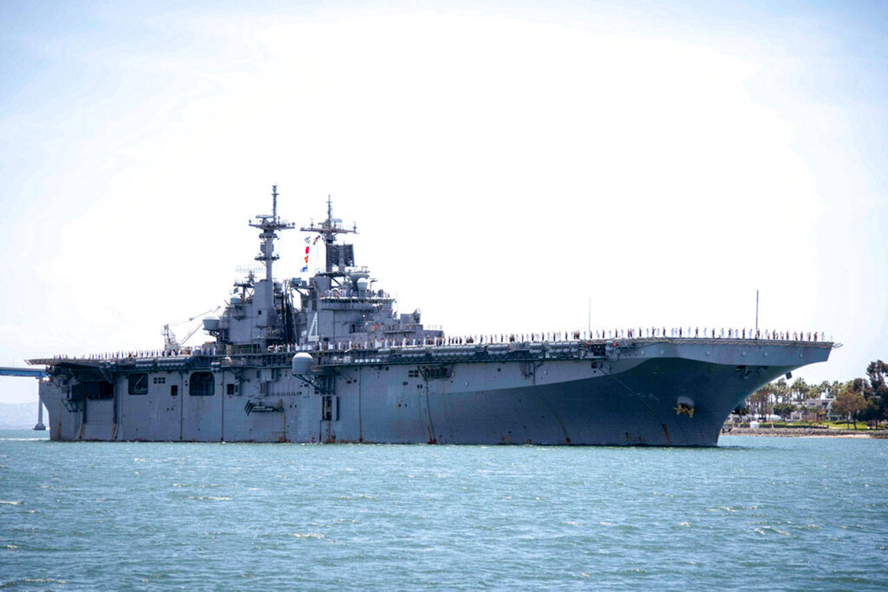 The amphibious assault ship USS Boxer transits San Diego Bay in San Diego, California, in May. President Trump says the USS Boxer destroyed an Iranian drone in the Strait of Hormuz amid heightened tensions between the two countries. (Mass Communication Specialist 2nd Class Jesse Monford/U.S. Navy via Associated Press)