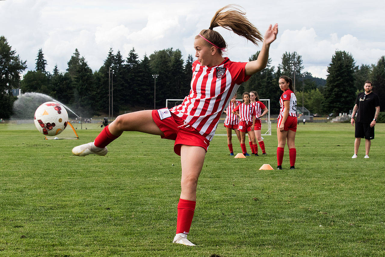 Snohomish United 05’s Kenzie Thompson-Sheldon tries a side kick toward the goal during practice July 11 at Stocker Fields in Snohomish. The girls soccer team won the Far West regional championship to advance to the 14-and-under US Youth Soccer National Championships in Overland Park, Kansas. (Andy Bronson / The Herald)