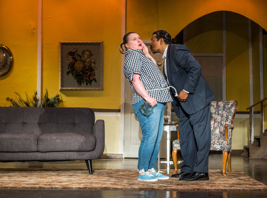 Jenny (Yvonne Williams) dodges a kiss from Randolph (Johnny Patchamtlata) in “Exit the Body.” (Olivia Vanni / The Herald)
