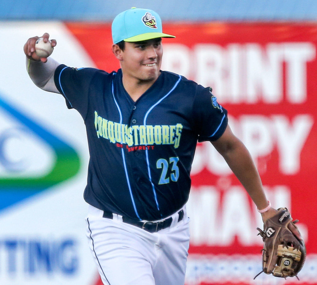 Austin Shenton throws to first base during a game between the AquaSox and the Canadians on July 11, 2019, at Funko Field at Everett Memorial Stadium. (Kevin Clark / The Herald)
