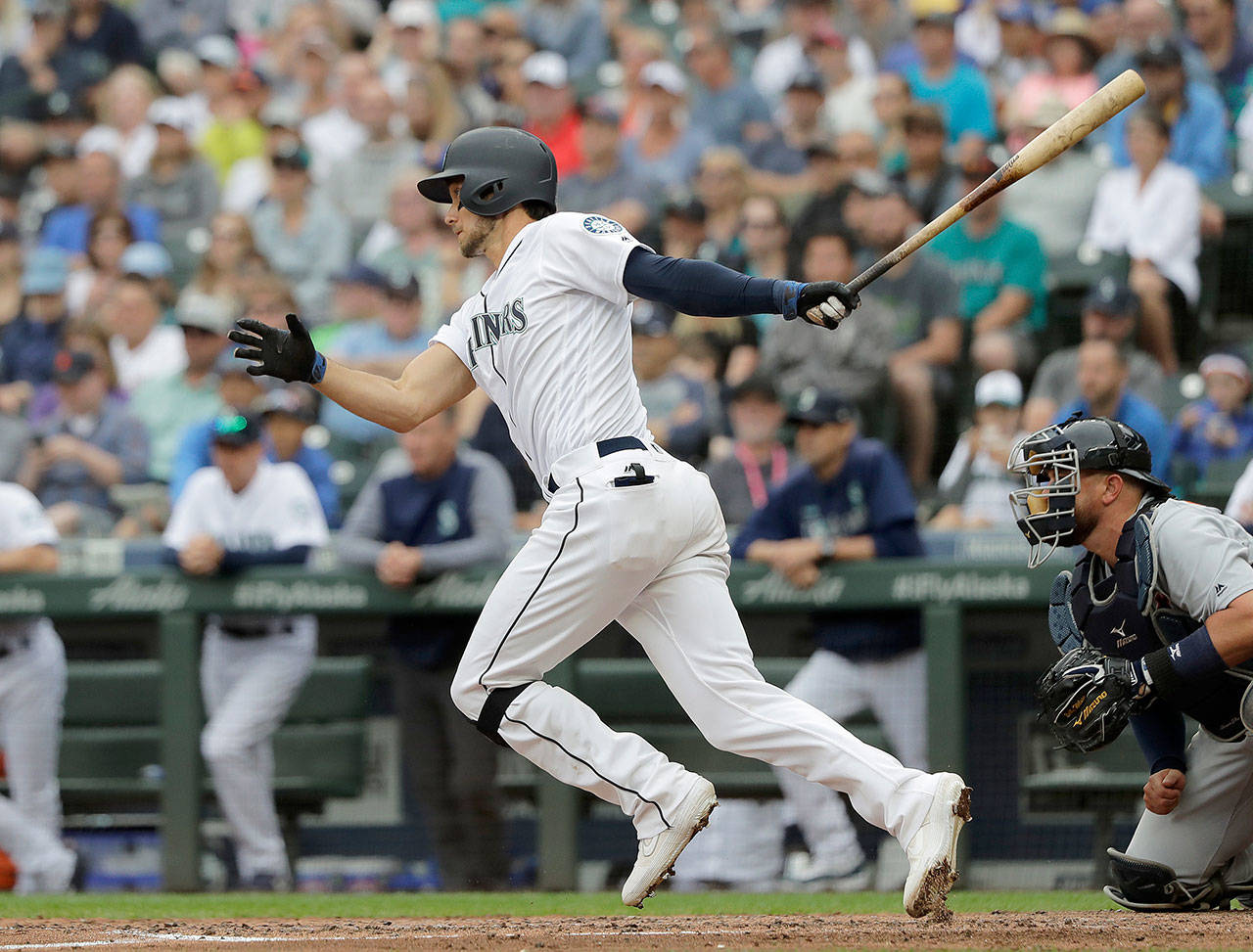 Seattle’s Ryan Court socks an RBI single for his first major-league hit during the Mariners’ 8-1 win over Detroit on Saturday in Seattle. (AP Photo/Ted S. Warren)
