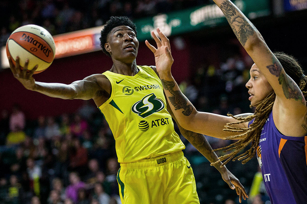 The Seattle Storm’s Natasha Howard attempts a layup during the season opener against the Phoenix Mercury on Saturday, May 25, 2019 in Everett, Wash. (Olivia Vanni / The Herald)