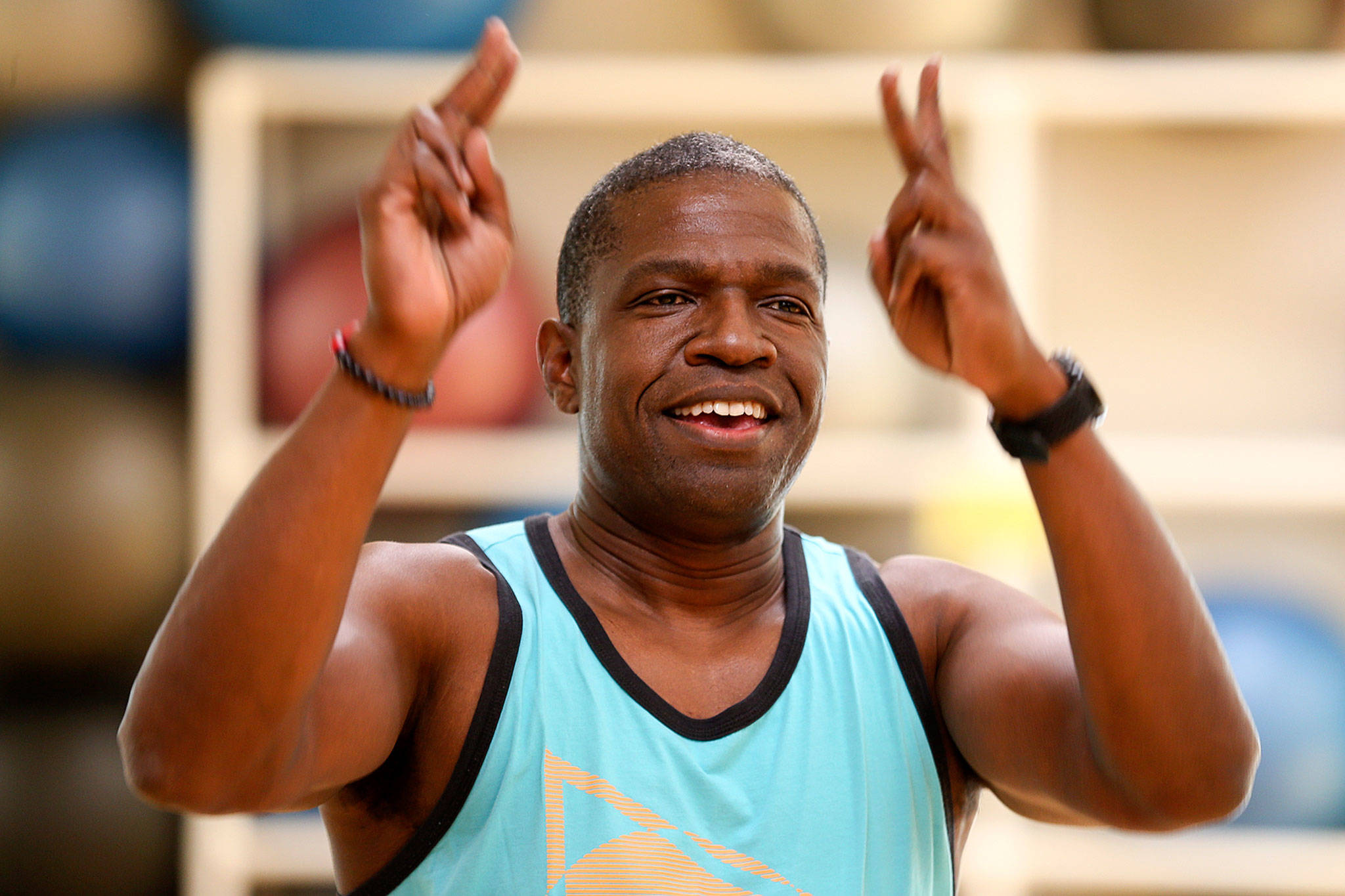 Mike Dixon prepares new steps for a Zumba class at the Mukilteo YMCA. He recently was certified as an instructor and has been training to have his own class. (Kevin Clark / The Herald)