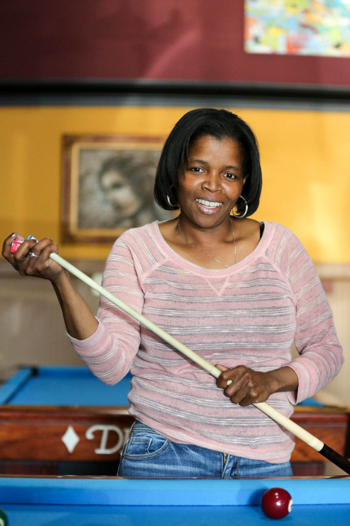 Kim Jones is a partner at Golden Fleece Billiards in Everett. (Kevin Clark / The Herald)
