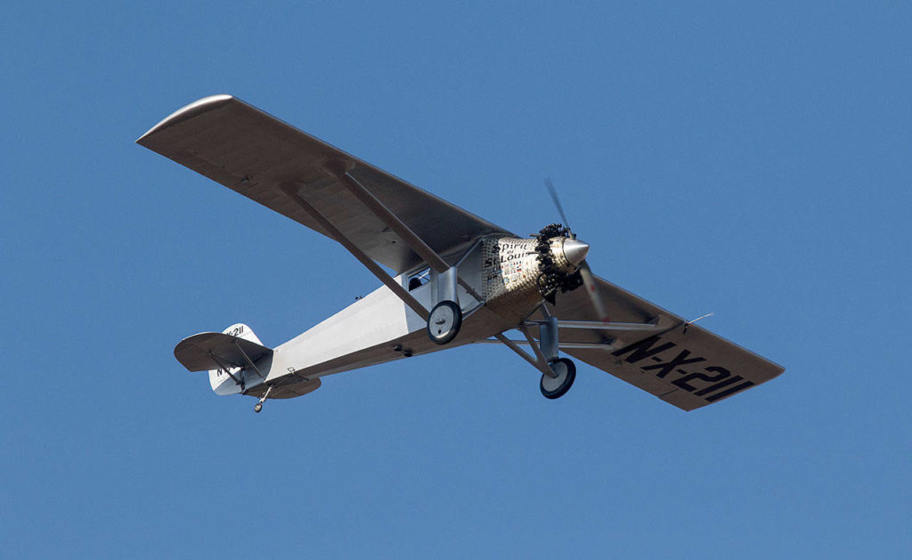 Pilot Ron Fowler takes John Norman’s replica of the Spirit of St. Louis on its first flight and circles around Arlington Municipal Airport on July 28. Norman’s replica is considered the most accurate replica made so far. (Andy Bronson / The Herald)
