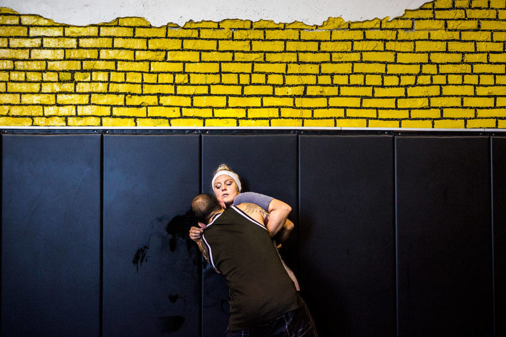 Miranda Granger works on her grappling technique with Charlie Pearson at Charlie’s Combat Club on July 26, 2019, in Everett. (Olivia Vanni / The Herald)
