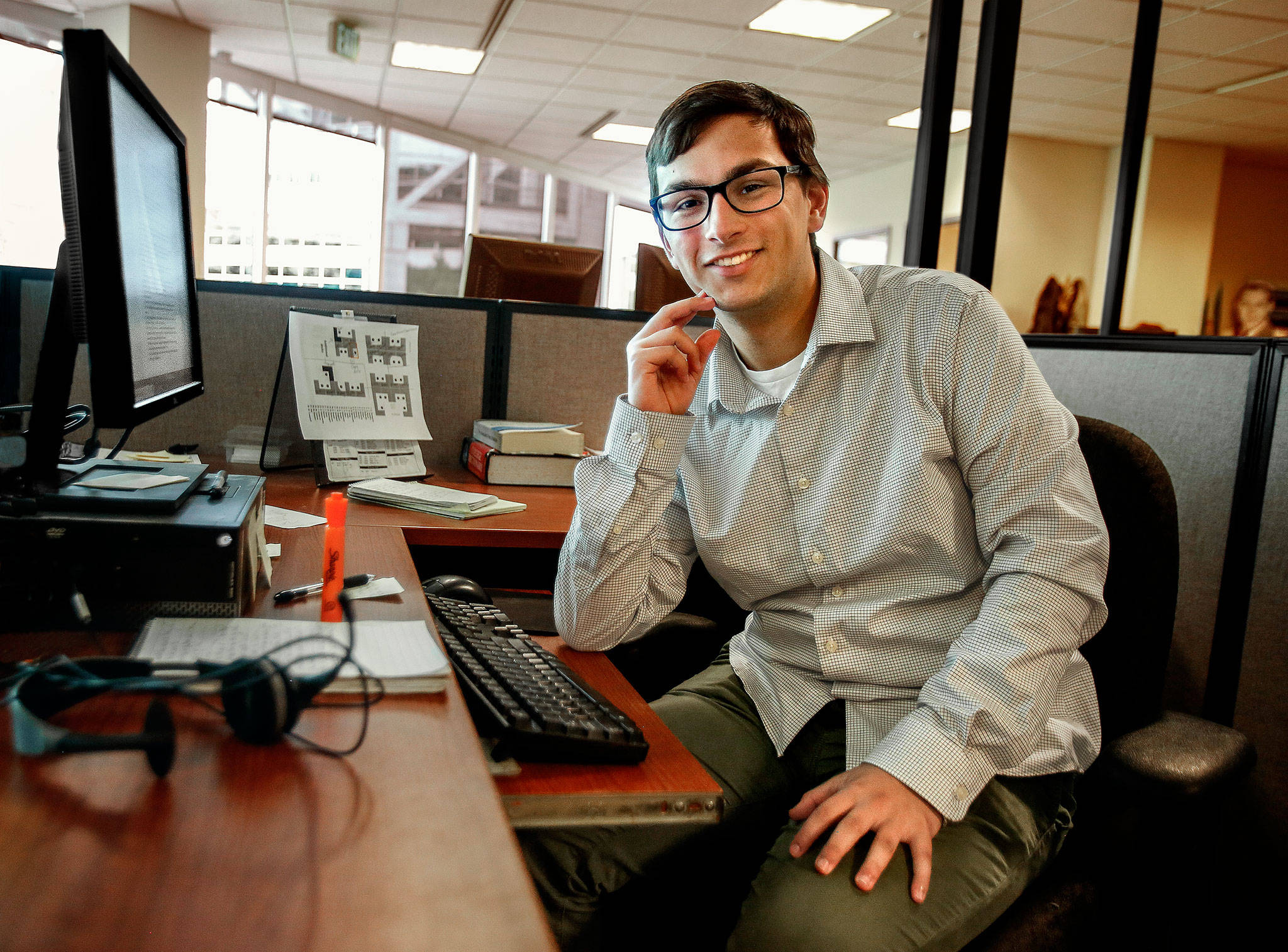 Ian Davis-Leonard was the Herald’s news intern this summer. He was a 3-year-old when columnist Julie Muhlstein featured his family in a column. Ian’s two moms shared their story in 2002. (Dan Bates / The Herald)