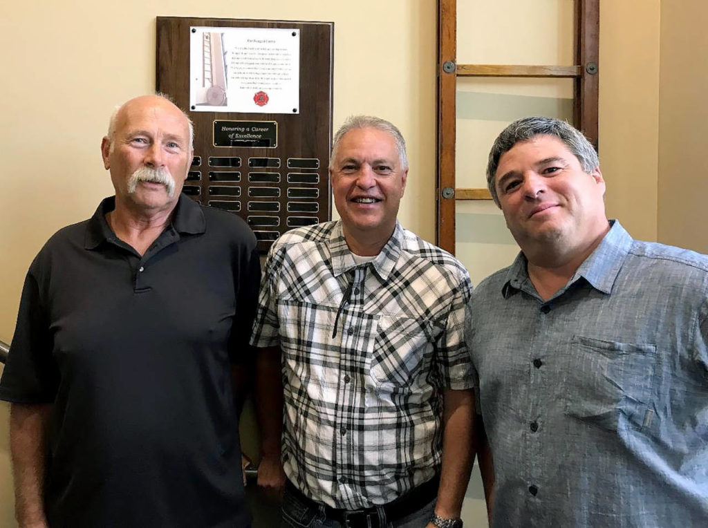Retired Arlington firefighters Harold Smith, Chief Doug Schmidt and Chief Tom Cooper are the first to receive the Rung of Honor award from the Arlington Fire Department. (City of Arlington)
