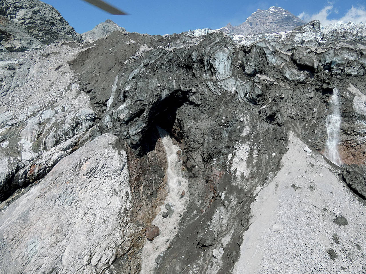 A debris flow occurred in Tahoma Creek on Aug. 5, originating from the terminus of the South Tahoma Glacier. (Scott Beason / National Park Service)