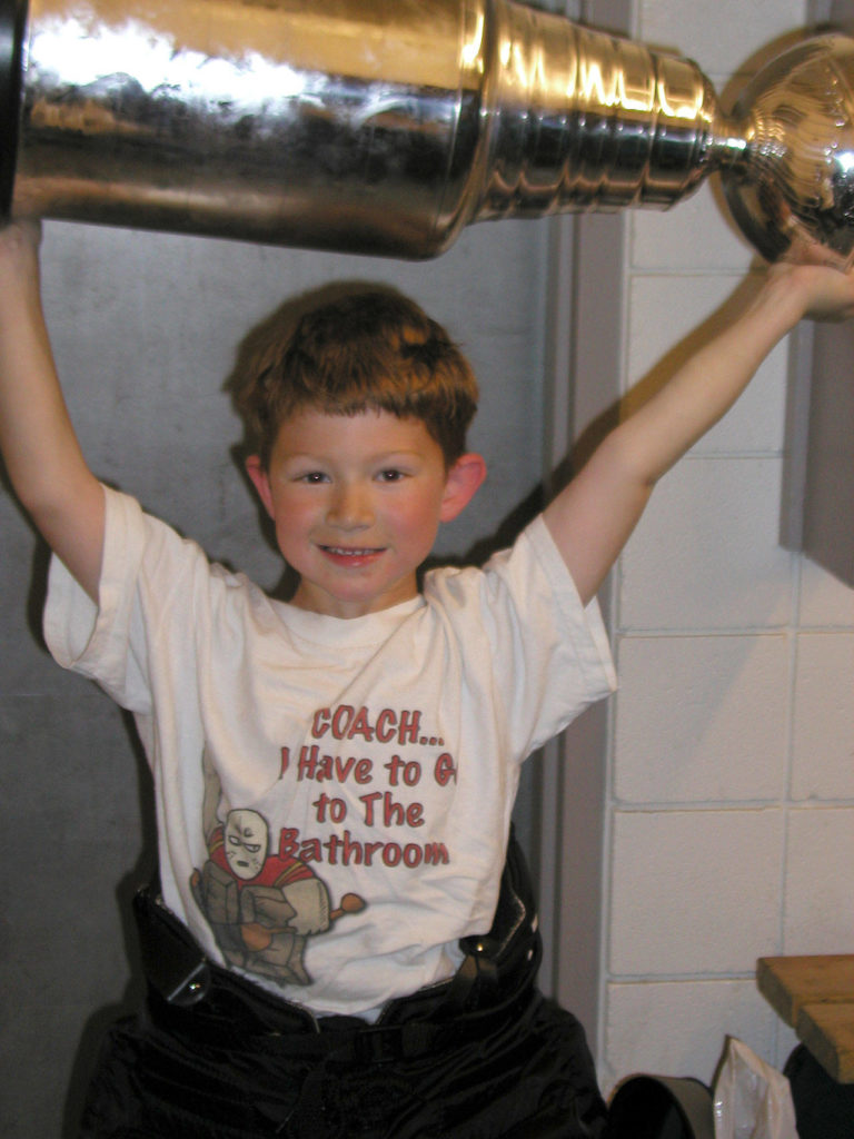 Dustin Wolf, 5, poses with a trophy after a tournament championship. (Photo courtesy of the Wolf family)
