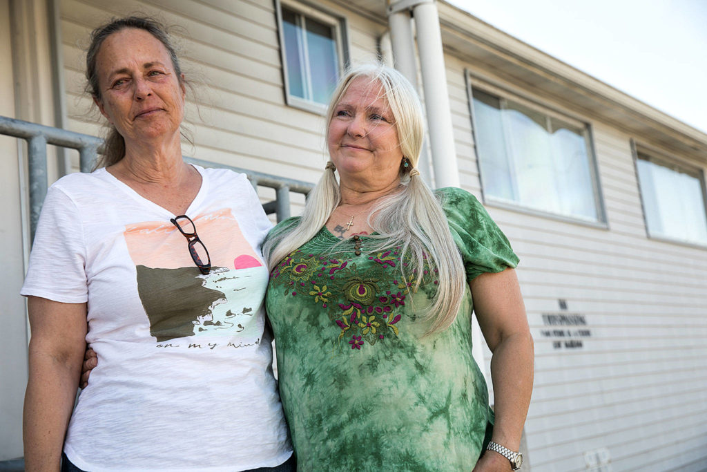 For over two decades, Kathleen Mullen (left) and Beverly Bowers (right) lived down the street from each other. (Lizz Giordano / The Herald)
