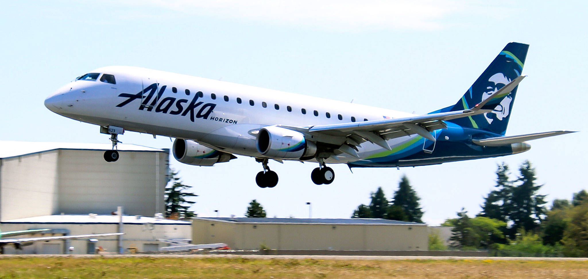 An Alaska Airlines Embraer 175, arriving from San Jose, lands at Paine Field in Everett on Tuesday. (Jennifer Schuld / twitter.com/JenSchuld)