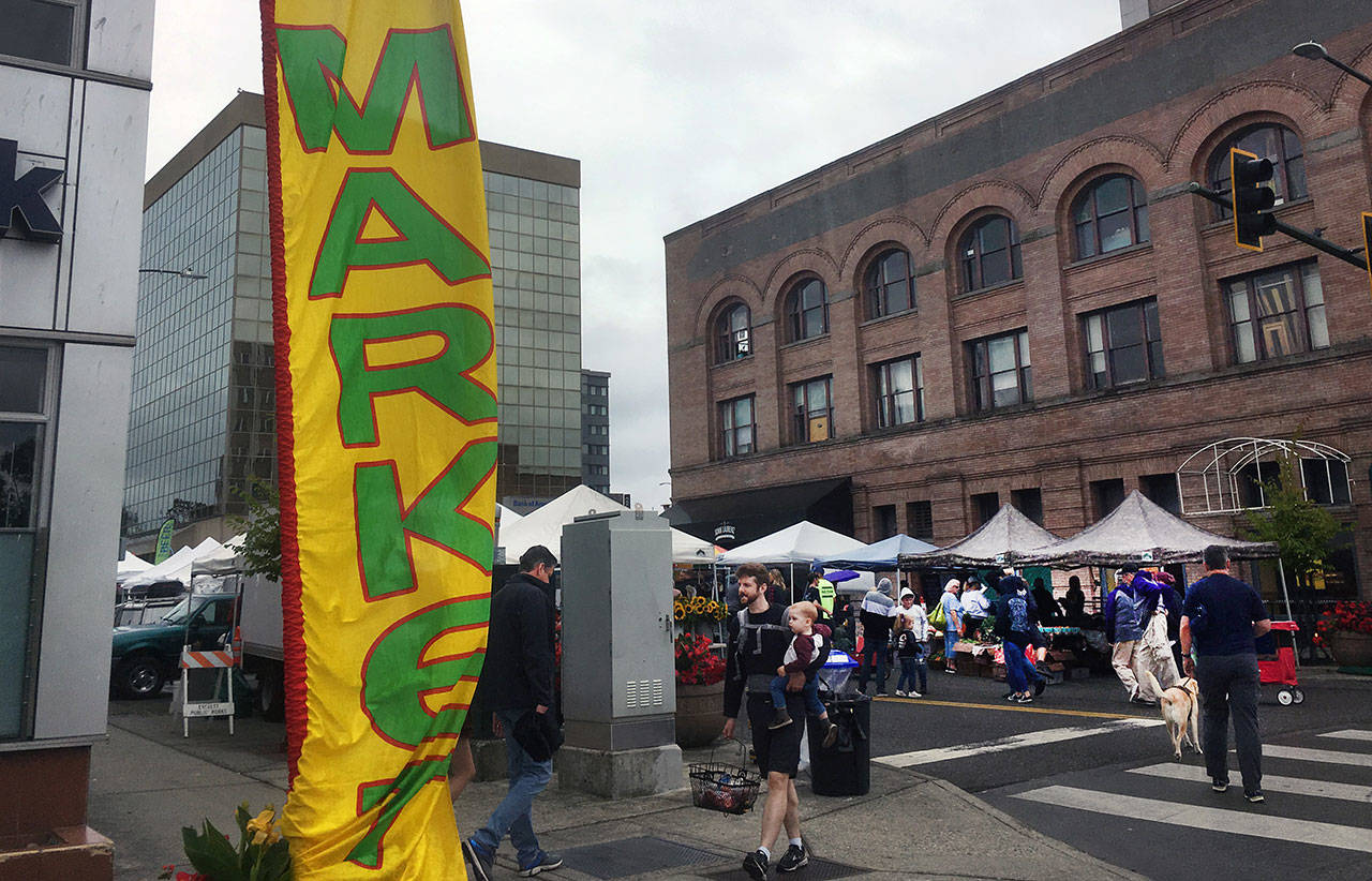 The Everett Farmers Market adjusted quickly to its new location on Wetmore Avenue on Aug. 4, following a move from the Port of Everett’s Boxcar Park. (Sue Misao / The Herald)