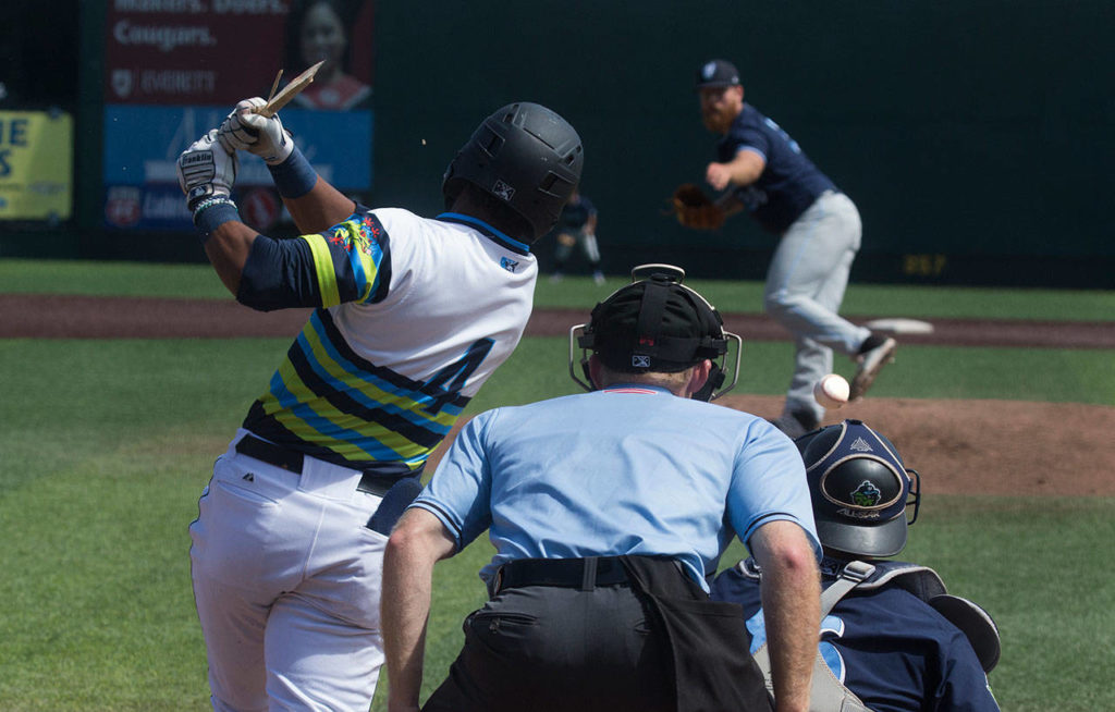 AquaSox’s Robert Perez ends up with the short end of the bat during the fifth inning as the Everett AquaSox take on the Hillsboro Hops at Funko Field on Tuesday, Aug. 13, 2019 in Everett, Wash. (Andy Bronson / The Herald)

