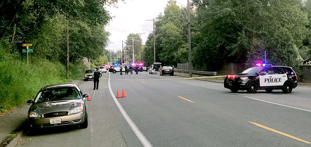 Police respond to the scene of an apparent road rage shooting on Glenwood Avenue near 51st Place SW in Everett on July 6. One man was killed. (Janice Podsada / Herald file)
