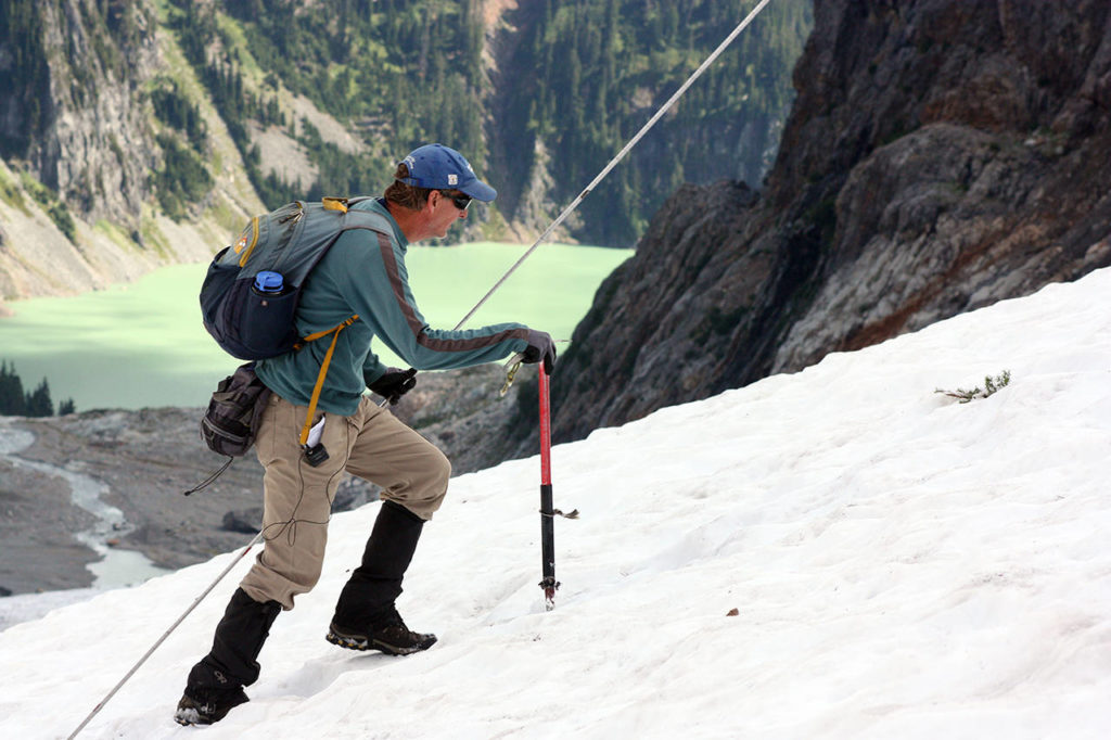 Glaciologist Mauri Pelto and a team of researchers spent Monday afternoon taking snow depth measurements. Much of the snow likely will be gone by summer’s end. (Zachariah Bryan / The Herald)
