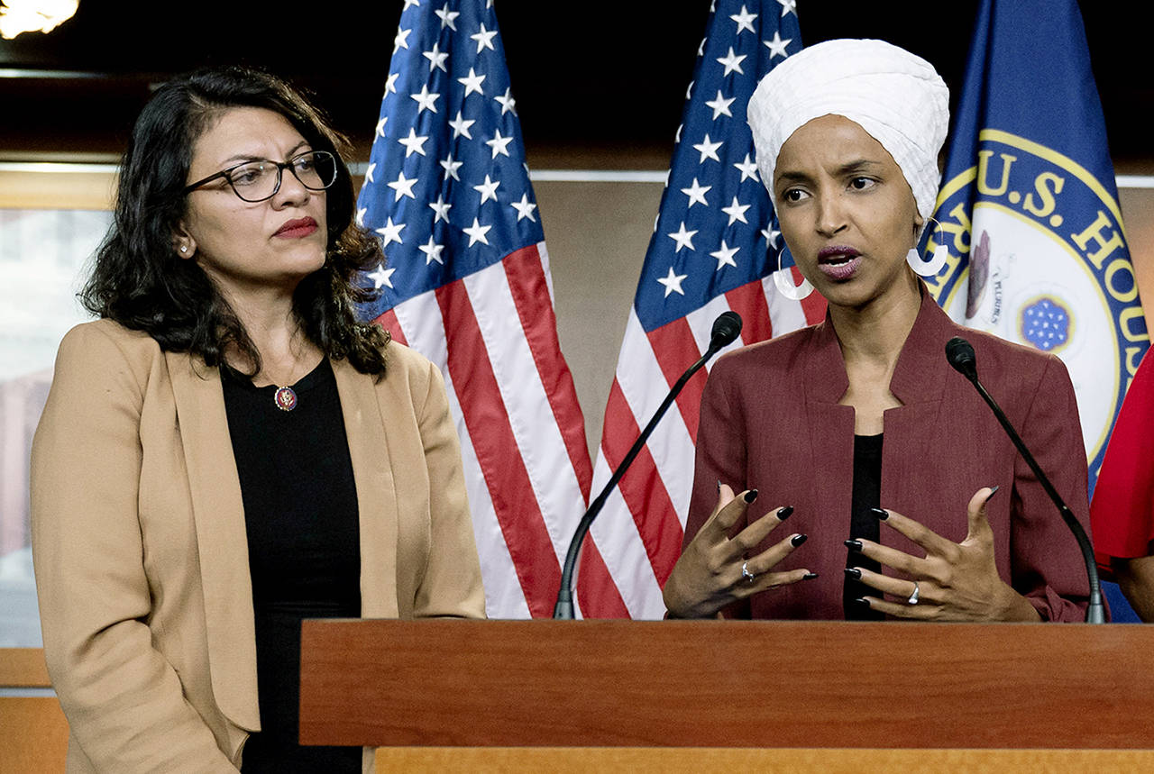 In this July 15 photo, U.S. Rep. Ilhan Omar, D-Minn (right) speaks as U.S. Rep. Rashida Tlaib, D-Mich., listens, during a news conference at the Capitol in Washington. (AP Photo/J. Scott Applewhite, File)