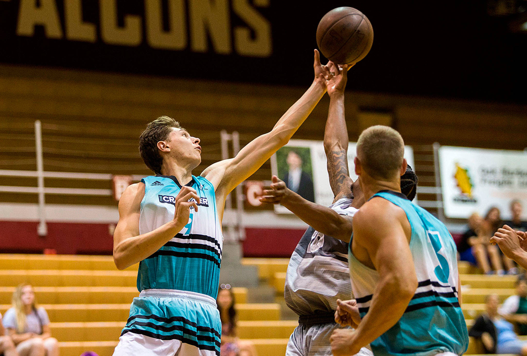 Former Monroe High School basketball star Colby Kyle gave up select soccer in ninth grade to focus on hoops. Kyle, pictured during “The Crawsover” pro-am league last summer, is now a sophomore on the Princeton University men’s basketball team. (Olivia Vanni / The Herald)