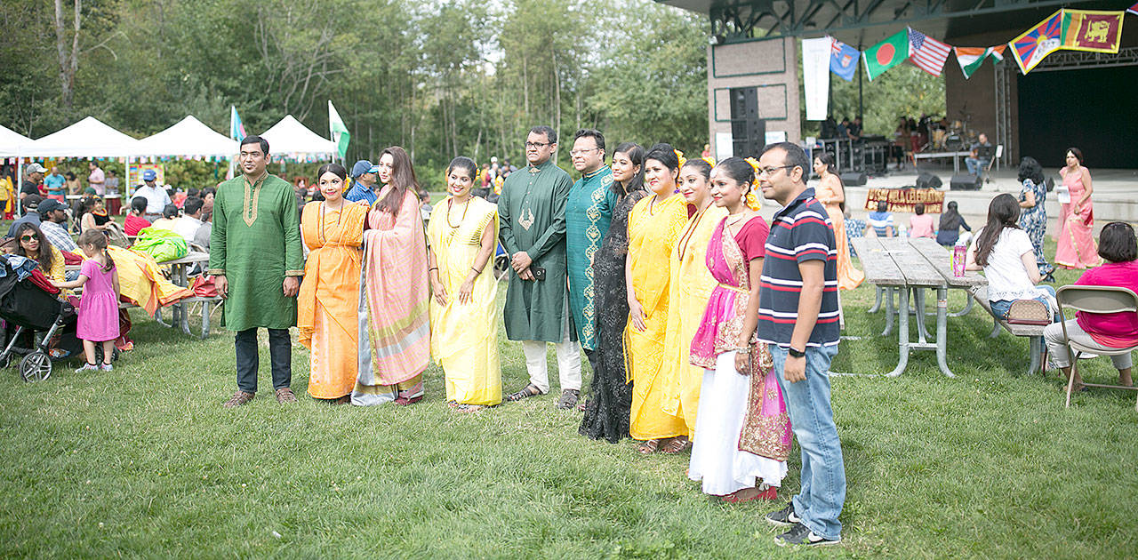 A group poses for a photo at the second annual UTSAV Mela. It’s a festival that celebrates South Asian cultures and aims to share traditional dances, food and fashion with area locals. (Julia-Grace Sanders / The Herald)