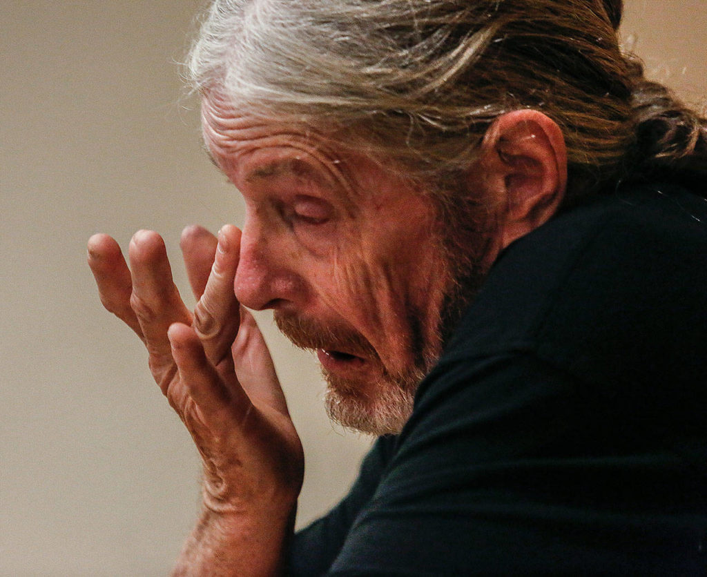 In a Quiet Room at the Everett Public Library Monday, Vietnam War veteran Bradley Andrews, 69, begins telling his story to two young Civil Air Patrol members. (Dan Bates / The Herald)
